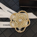 Chanel Camellia Pearl Brooch