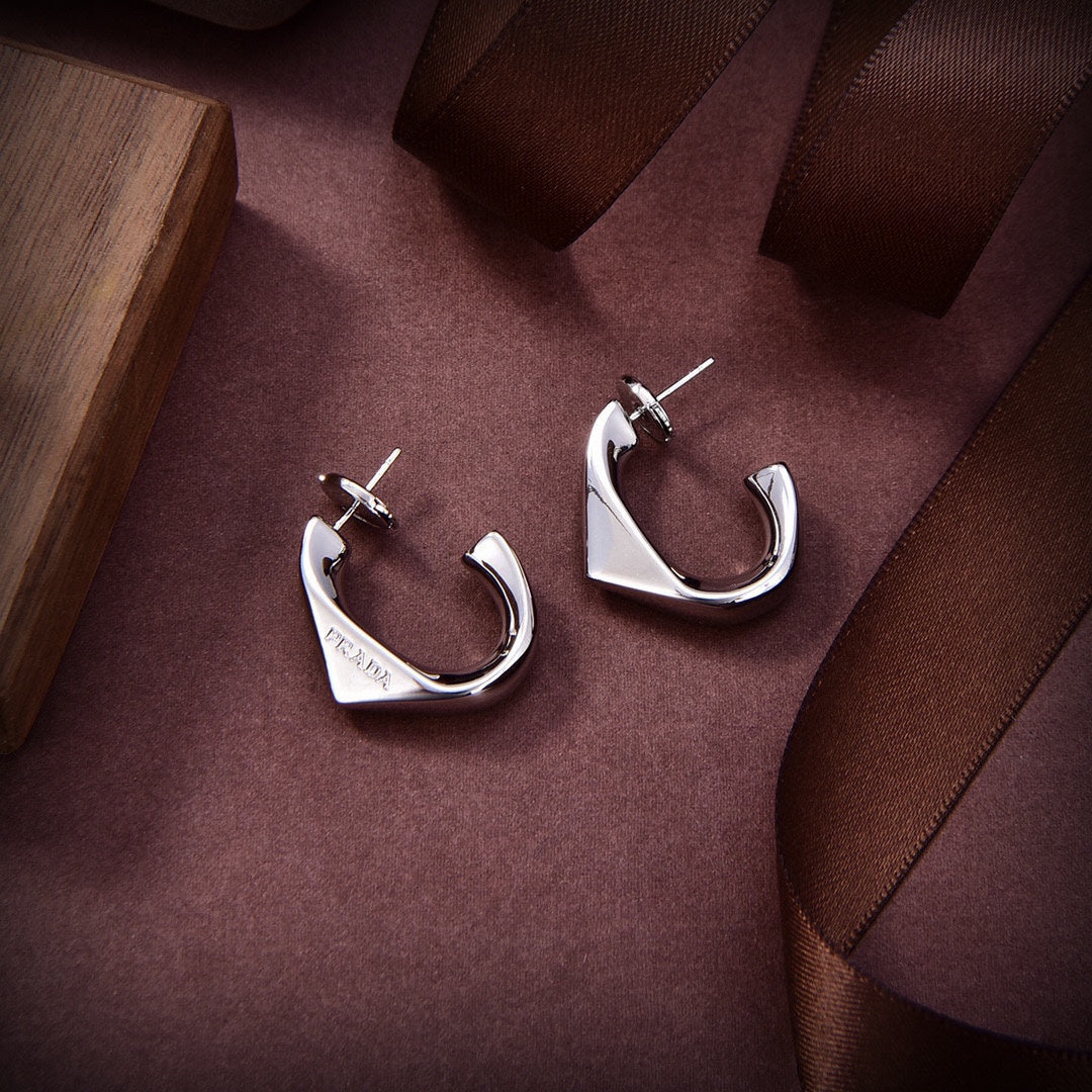 Prada Triangle Open Earrings - 18K Gold