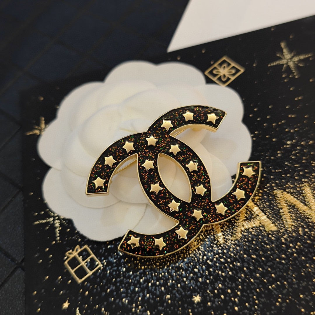 Chanel Black Star Brooch
